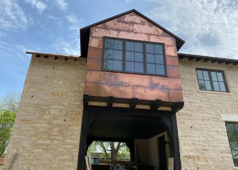 Copper metal panel facade on a stone building for Metal Roof Coating in Mount Laurel